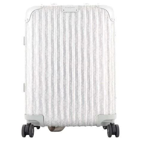 trolley dior|Dior rimowa clutch.